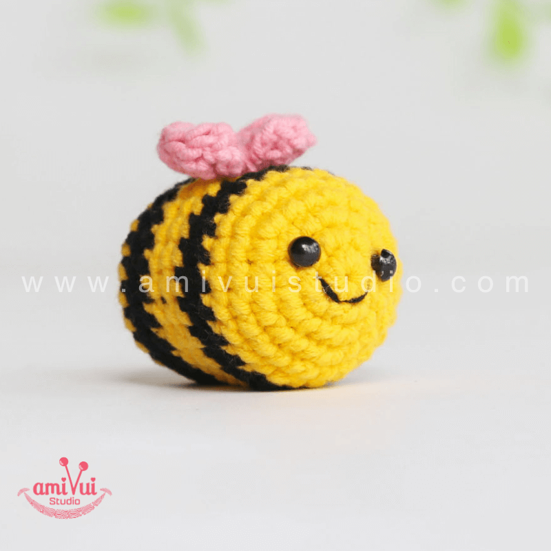 Crochet Tiny Bee keychain - Free Amigurumi Pattern by AmivuiStudio