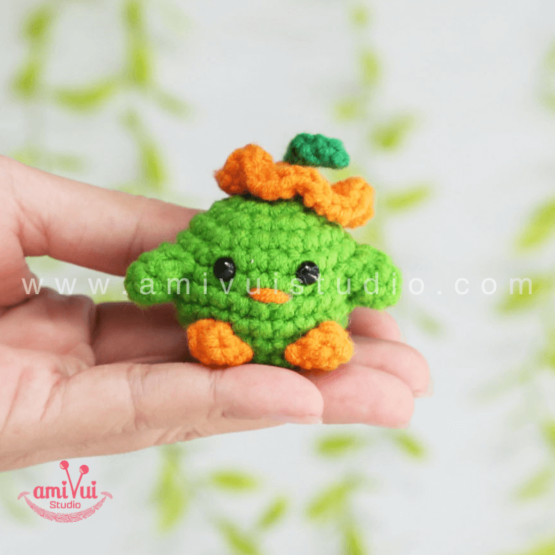 Crochet Tiny Green Bird keychain - Free Amigurumi Pattern by AmivuiStudio