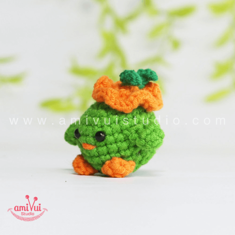 Crochet Tiny Green Bird keychain - Free Amigurumi Pattern by AmivuiStudio