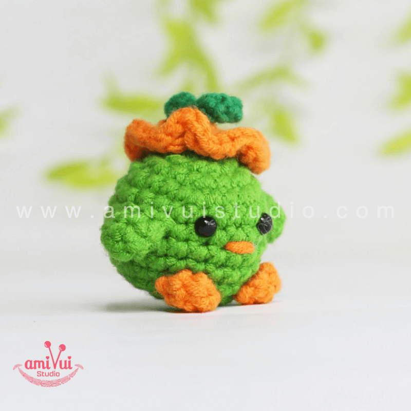 Crochet Tiny Green Bird keychain - Free Amigurumi Pattern by AmivuiStudio