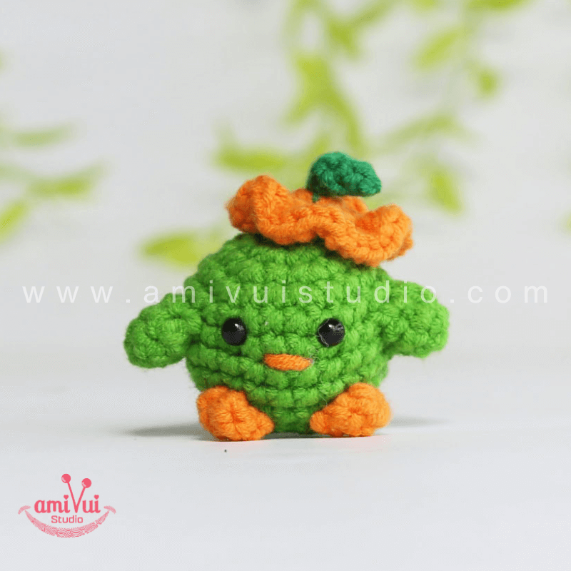 Crochet Tiny Green Bird keychain - Free Amigurumi Pattern by AmivuiStudio