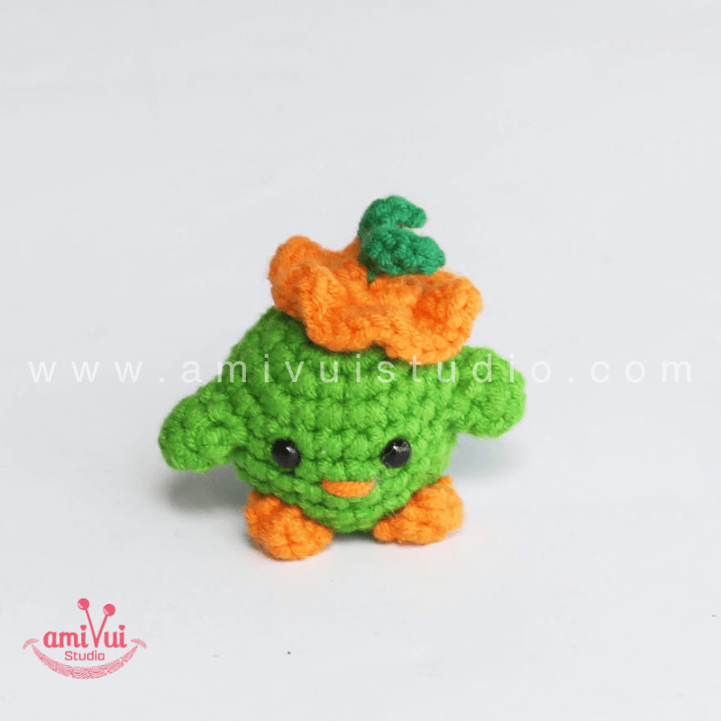 Crochet Tiny Green Bird keychain - Free Amigurumi Pattern by AmivuiStudio