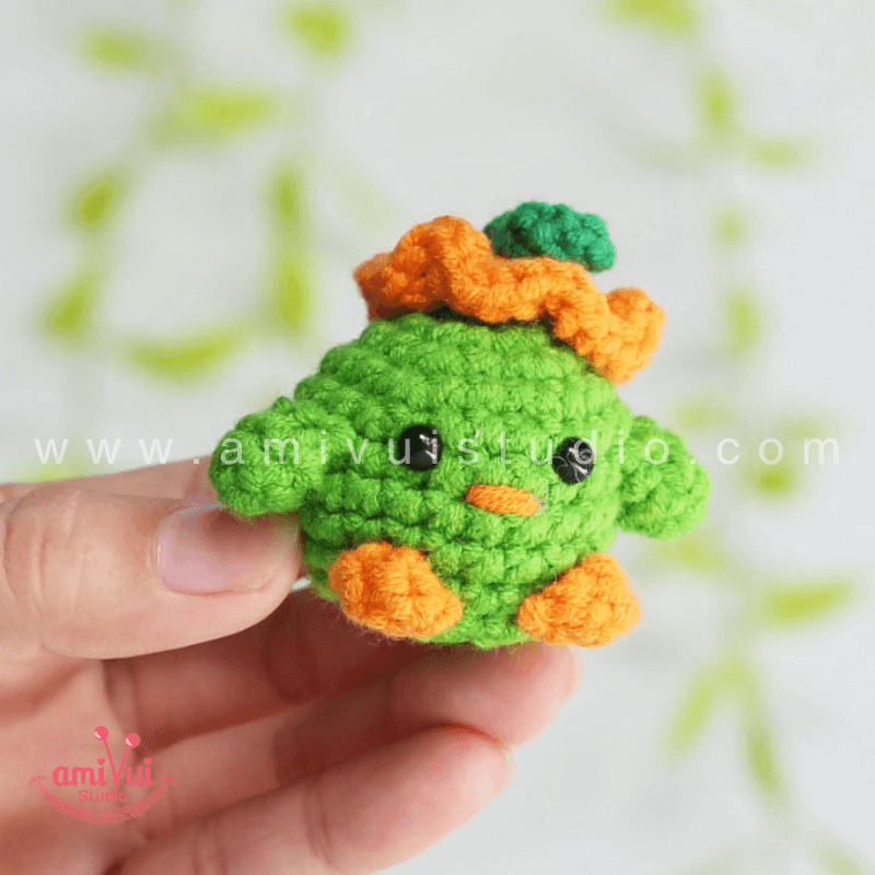 Crochet Tiny Green Bird keychain - Free Amigurumi Pattern by AmivuiStudio