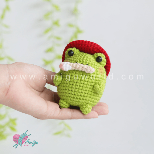 Crochet a little artist – Amigurumi chubby frog painter